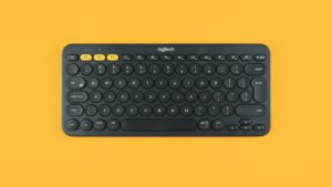 Logitech keyboard on a yellow background