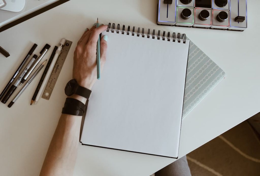 left handed person holding pencil