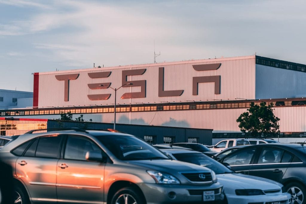 Tesla Building With Cars Outside