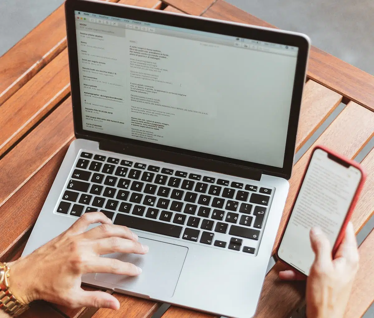 Email Marketing 5 Person scrolling through their emails on laptop and phone