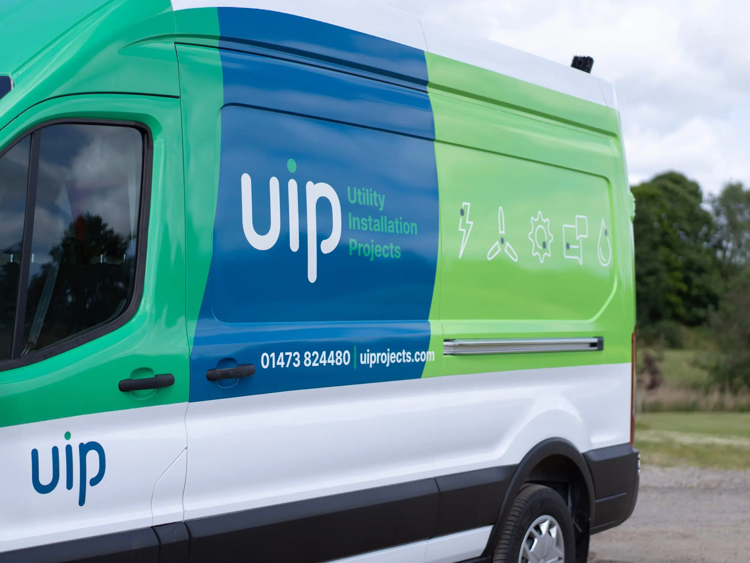 Vehicle Livery Design 2 An image of the side of a Utility Installation Projects van displaying their logo